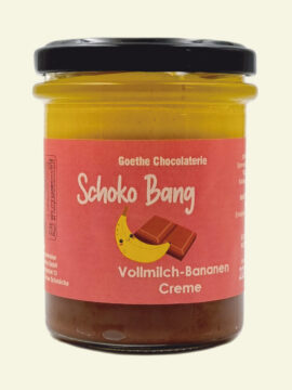 Schoko Bang Vollmilch Bananen Creme. Brotaufstrich Geschmacksrichtung Vollmilch Bananen Creme der Marke Goethe Chocolaterie in einem Glas mit Schraubverschluss